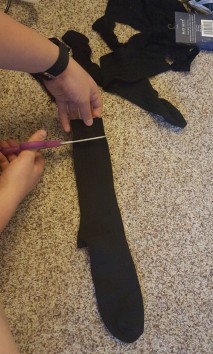 I first cut off the cuff at the opening of the sock.