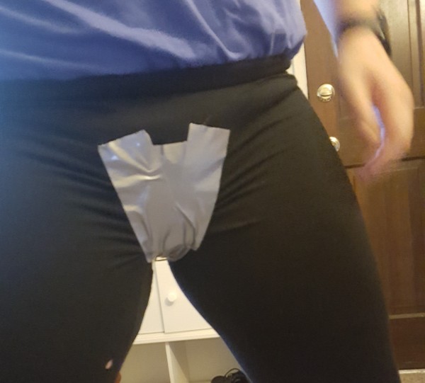 I show off the final tuck using the duct tape and feel slightly embarrassed how much of my crotch is on the internet